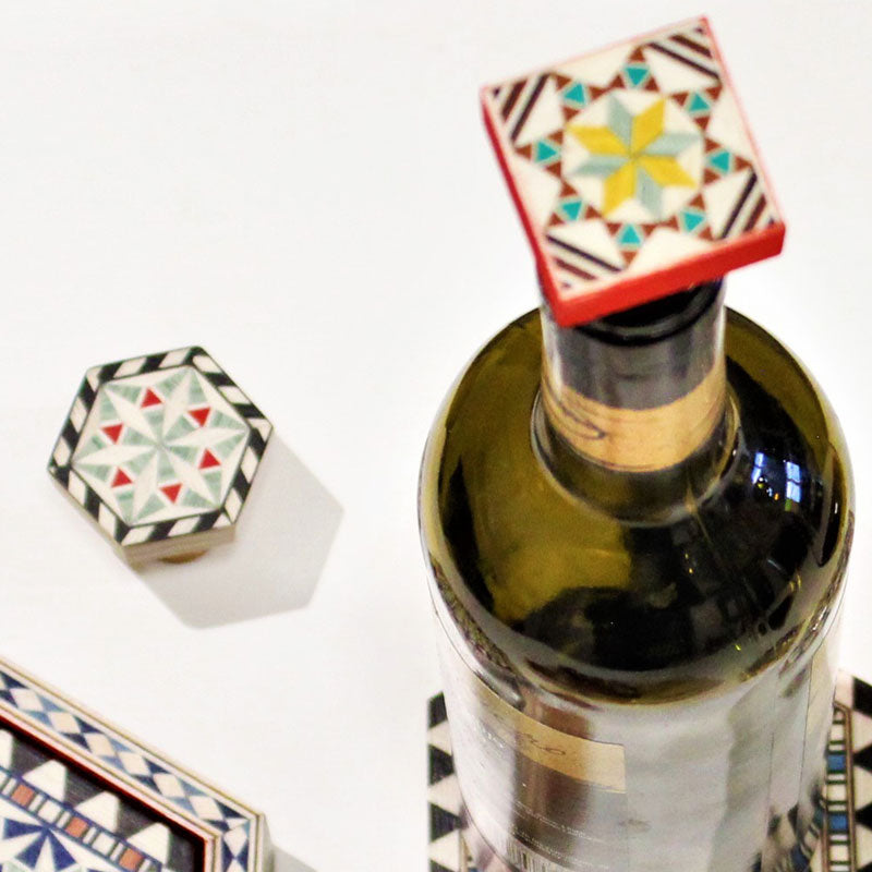 Blue and yellow hexagon wine stopper